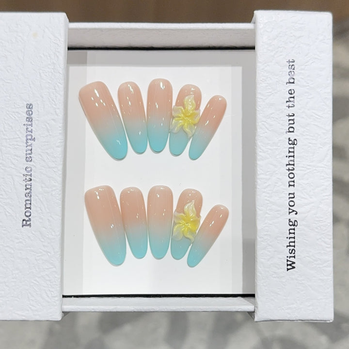 Artificial nails with enchanting ombre effect and floral accents Bowlift
