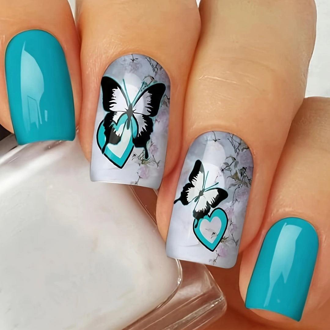 Artistic Butterfly-Themed Nail Art Bowlift