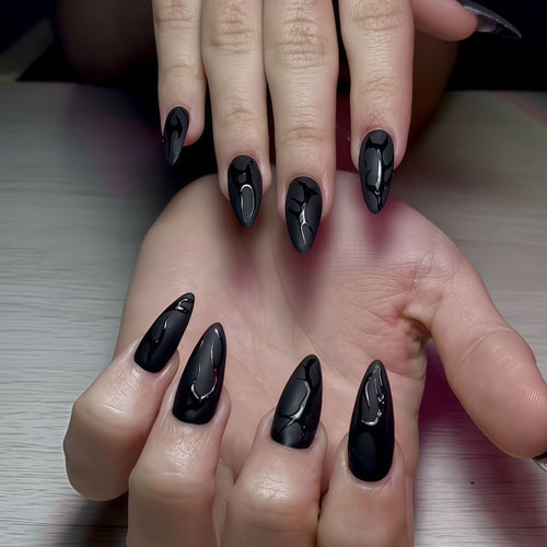 Artistic Stiletto Nail Design with Glossy Finish Bowlift