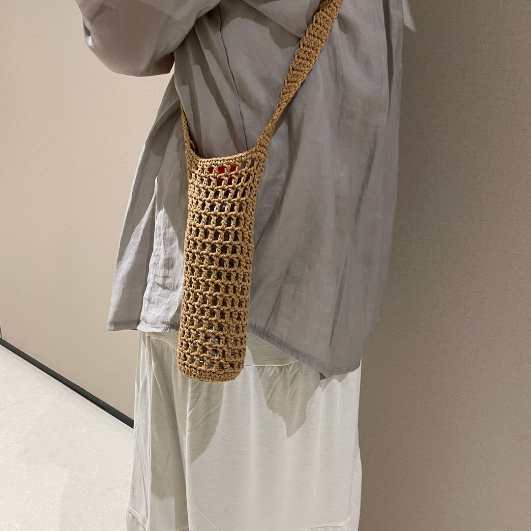 Hand-knotted bottle carrier Bowlift