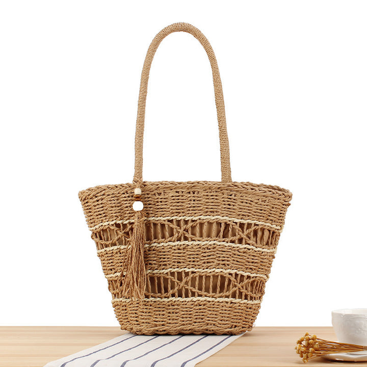 Hand-knotted shopping bag made of natural weave with elegant tassel decoration Bowlift