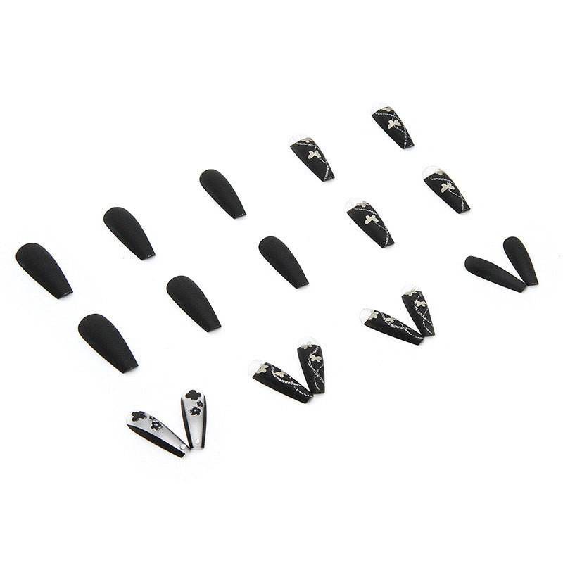 Art nail set with elegant butterfly and flower motifs Bowlift