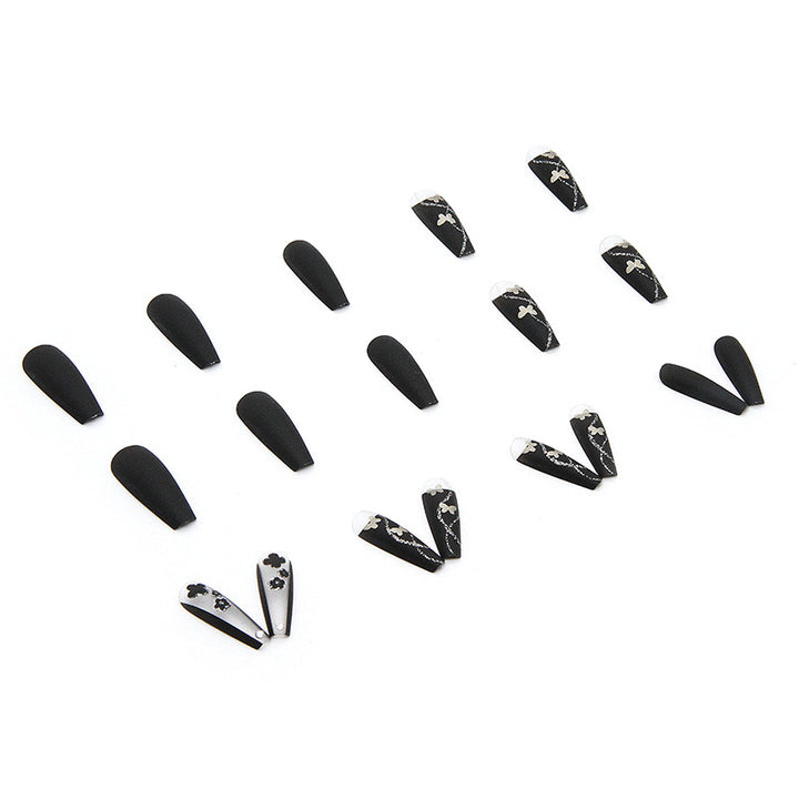 Art nail set with elegant butterfly and flower motifs Bowlift