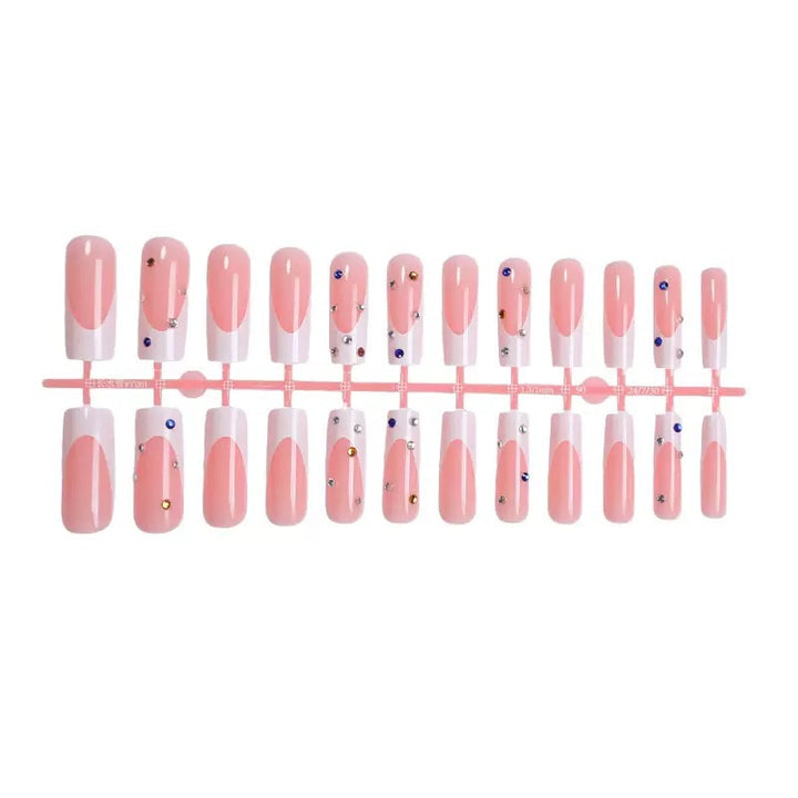Artificial nails with sparkling rhinestone accents Bowlift