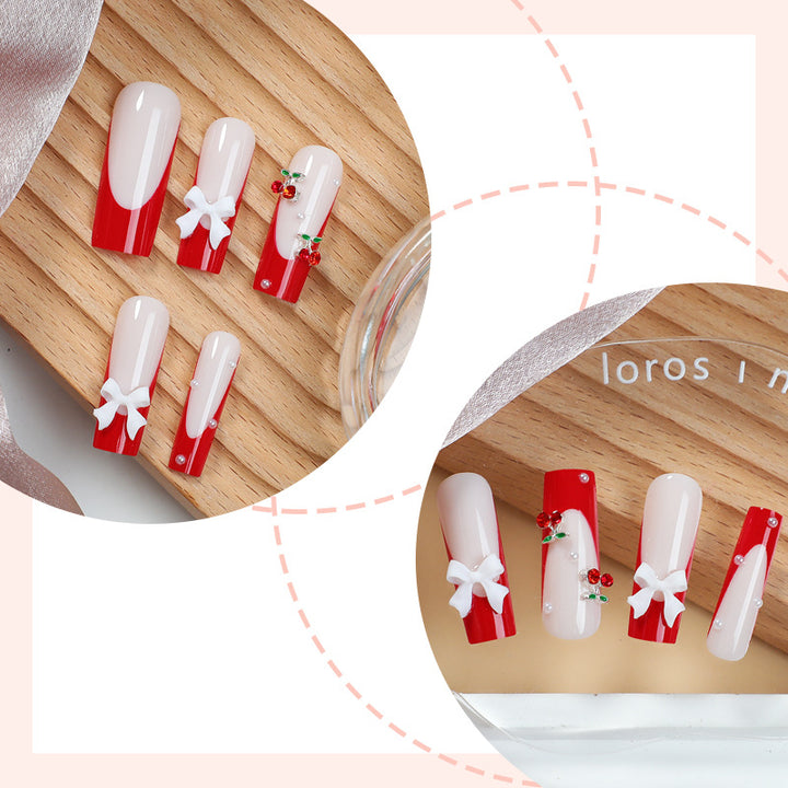 Creative nail set with festive cherry motifs Bowlift