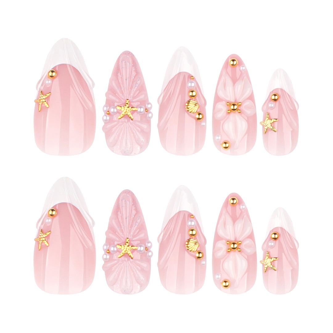 Artful nail art with shell and flower accents Bowlift