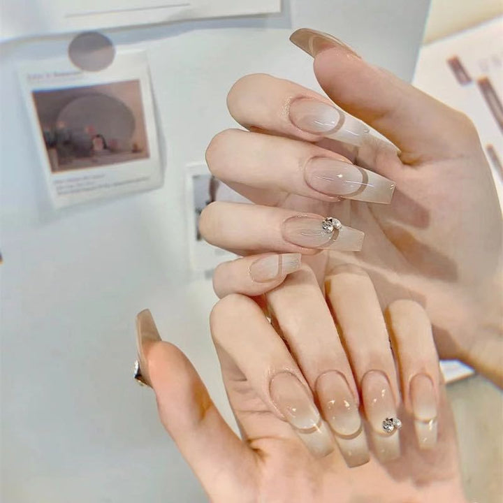 Artful French Tip Art Nails with Rhinestone Accents Bowlift