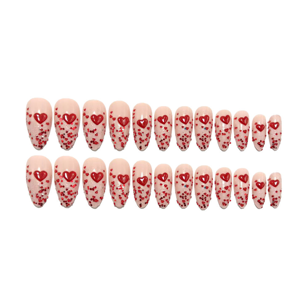 Glamorous artificial nails with heart design and glitter Bowlift