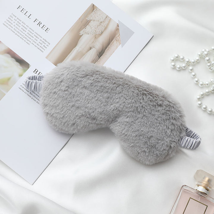 Women's fluffy ergonomic eye mask with adjustable satin band and soft faux fur cover Bowlift