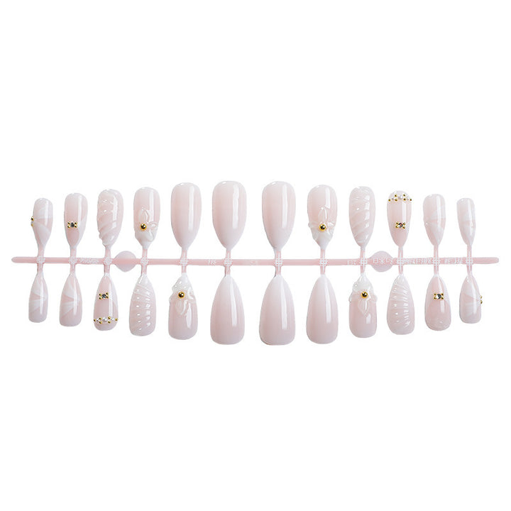 Acrylic nail set with luxurious and stylish decorations Bowlift
