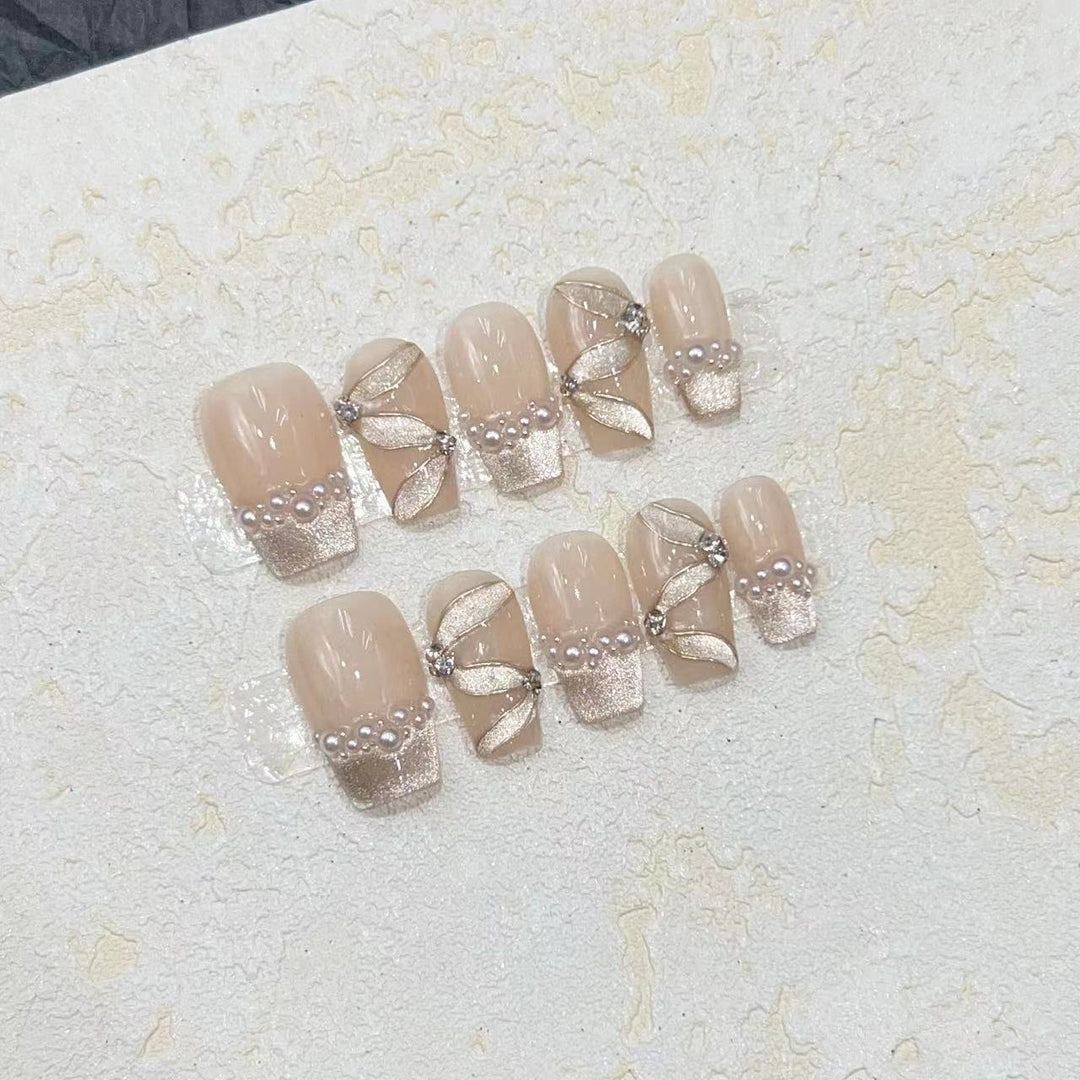 Luxurious Decorative Press-On Nail Set with Pearl and Gemstone Accents Bowlift