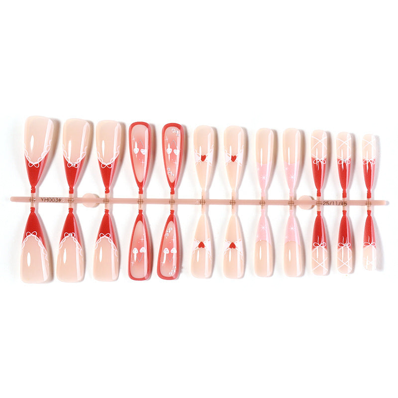 Artificial nail set with romantic heart and bow motifs Bowlift
