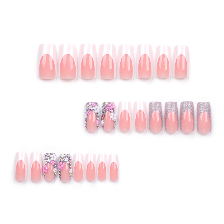Artificial nails with floral decorations and glitter effects Bowlift