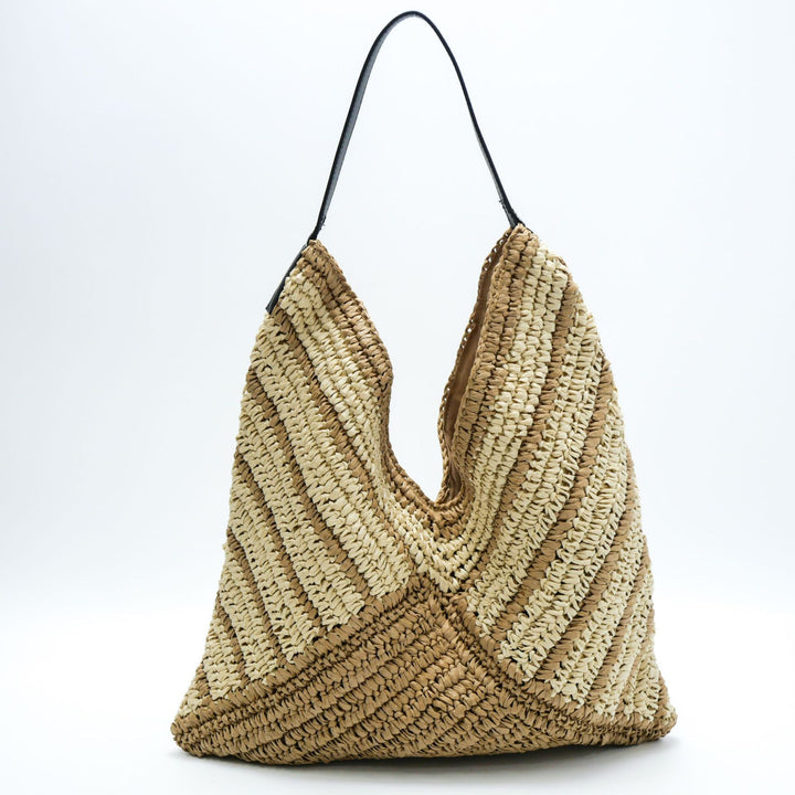 Leisure bag made of braided natural material Bowlift