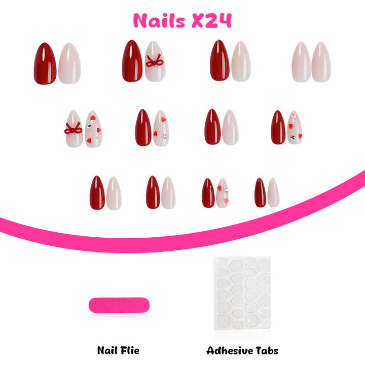 Artificial nail set with festive heart and bow accents Bowlift