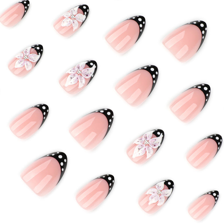 Artistic nail art with floral designs and elegant accents Bowlift