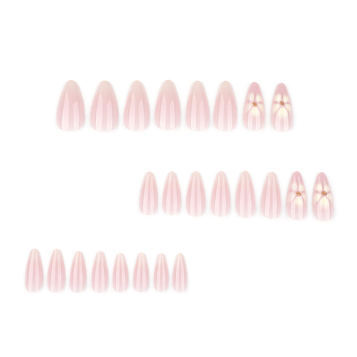 Elegant Stiletto Nails with Floral Accents Bowlift