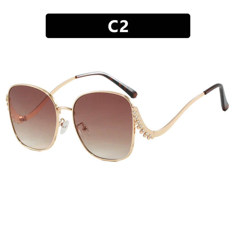 Women's striking sunglasses with sparkling appliqués Bowlift