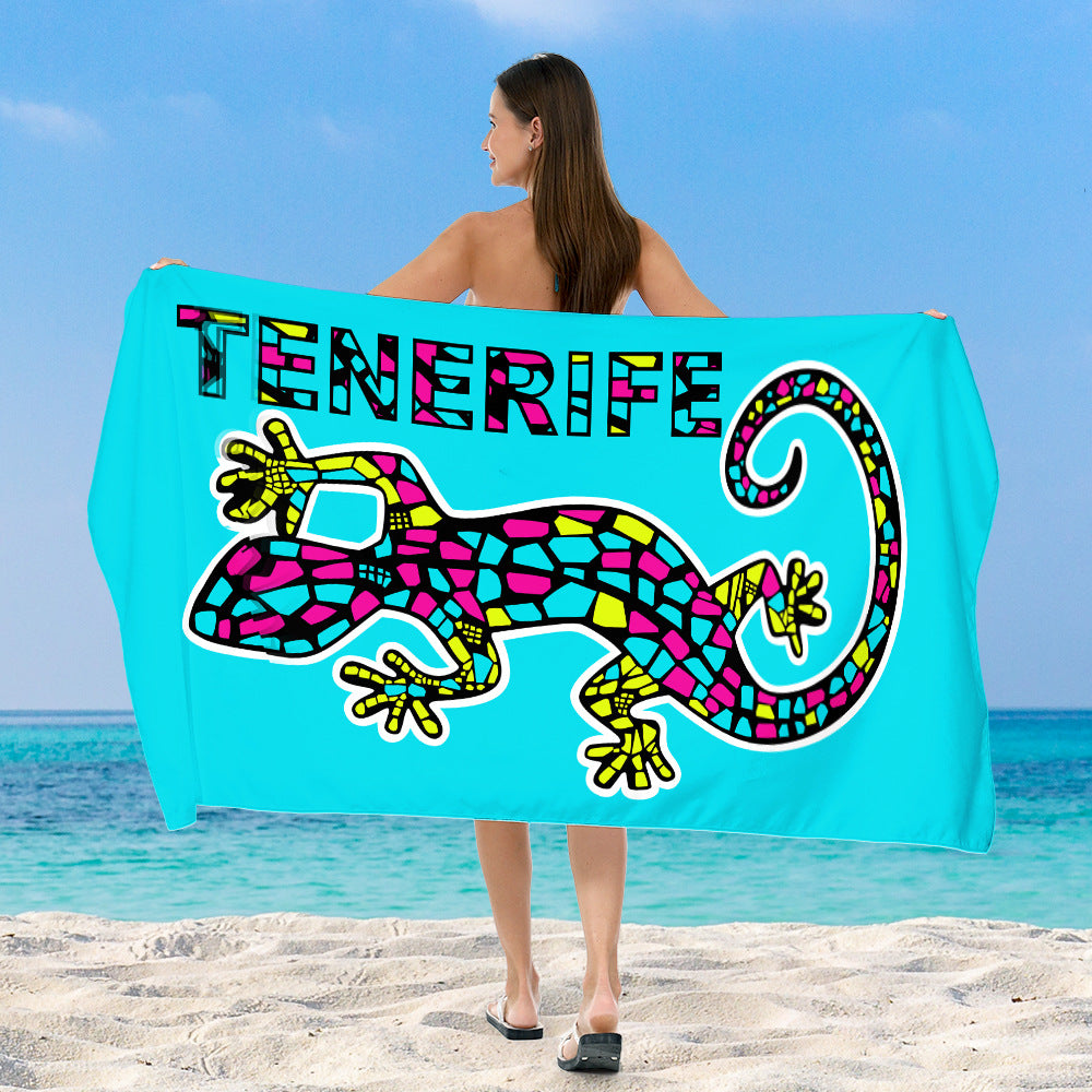 Beach towel with vibrant, colorful animal motif Bowlift