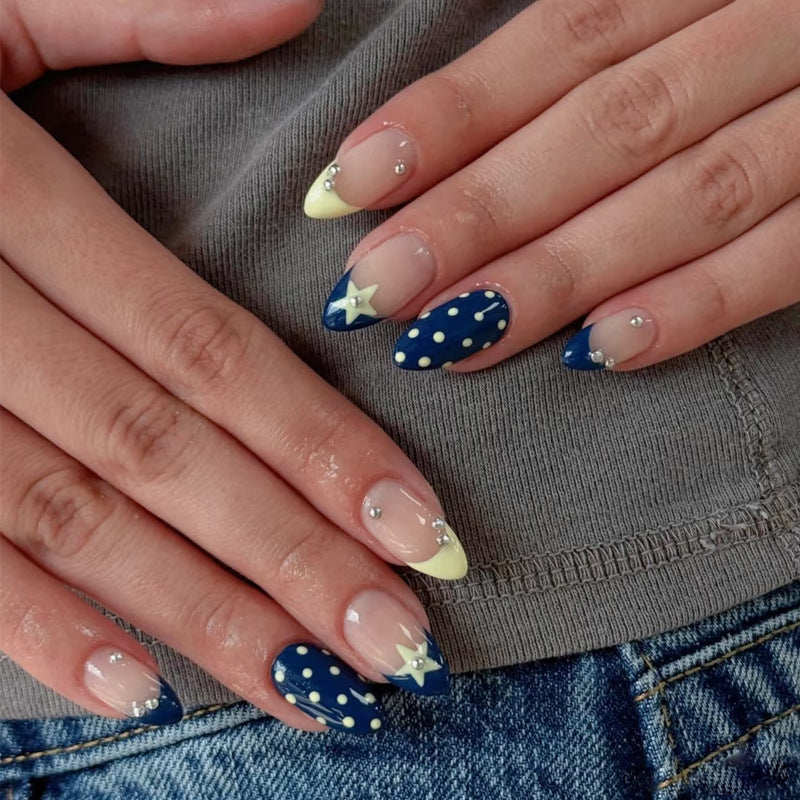 Artistic Nail Design with Star and Polka Dot Accents Bowlift