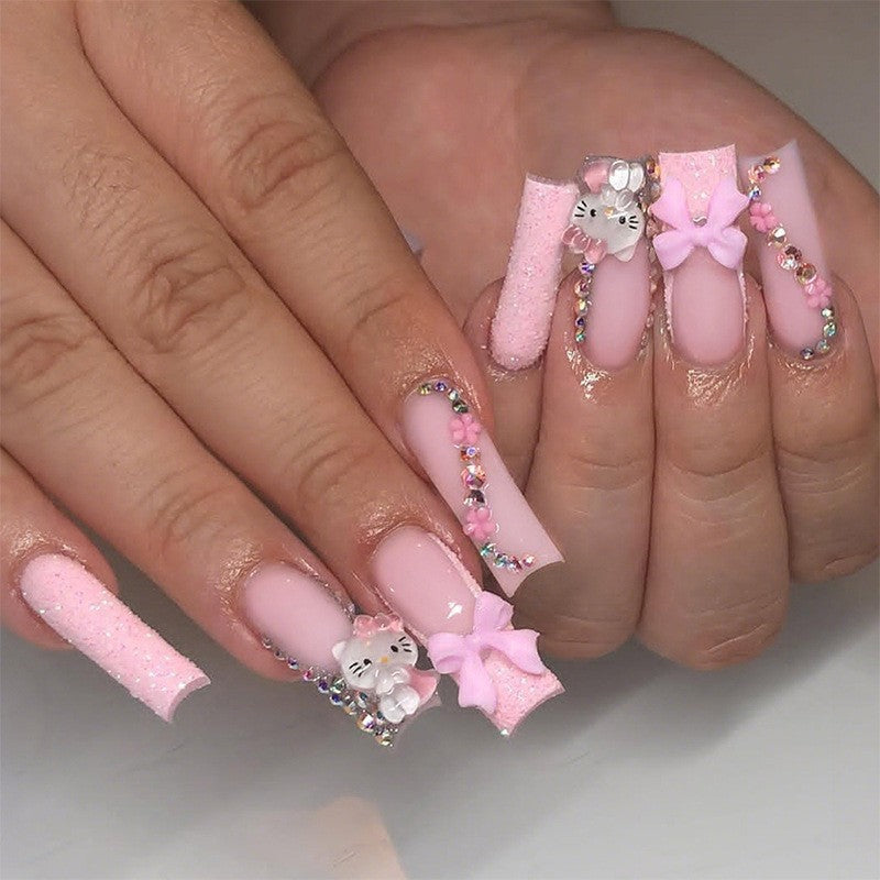 Glamorous artificial nail set with sparkling rhinestone embellishments and creative animal designs Bowlift