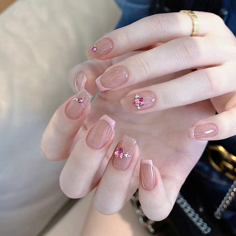 Artistic Press-On Nail Set with Glittery Star Accents Bowlift