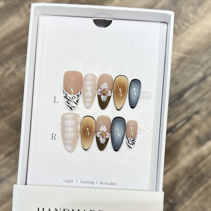 Artistic Stiletto Press-On Nail Set with Floral Accent Bowlift
