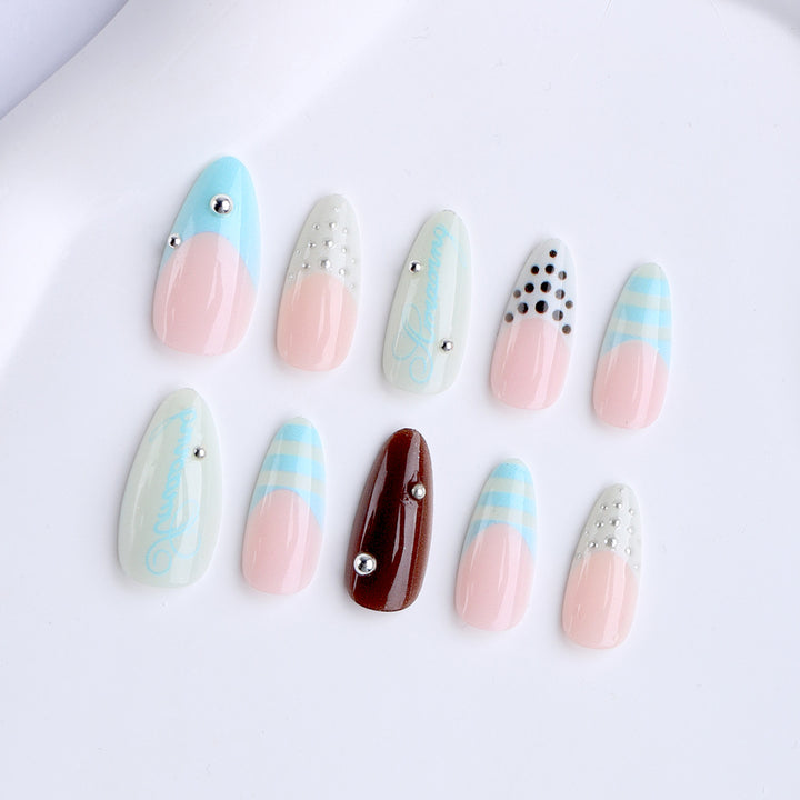Artificial stiletto nails with glamorous applications Bowlift
