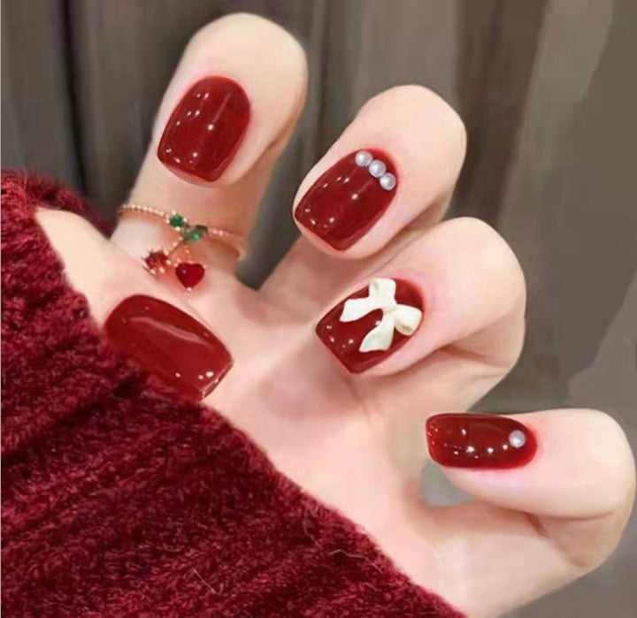 Artistic nail set with 3D flower and bow details Bowlift