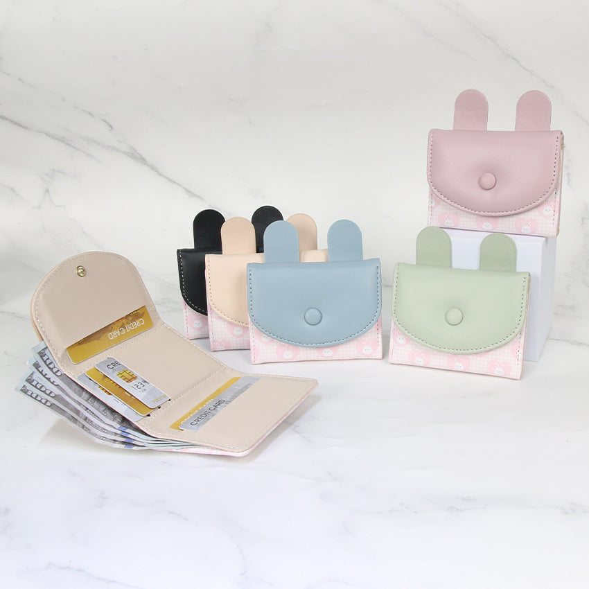 Compact rabbit-themed coin purse with snap closure and card slots Bowlift
