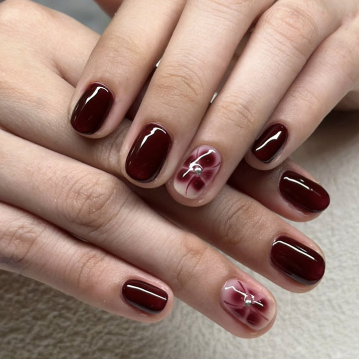 Elegant Nail Art with Glitter and Flower Elements Bowlift