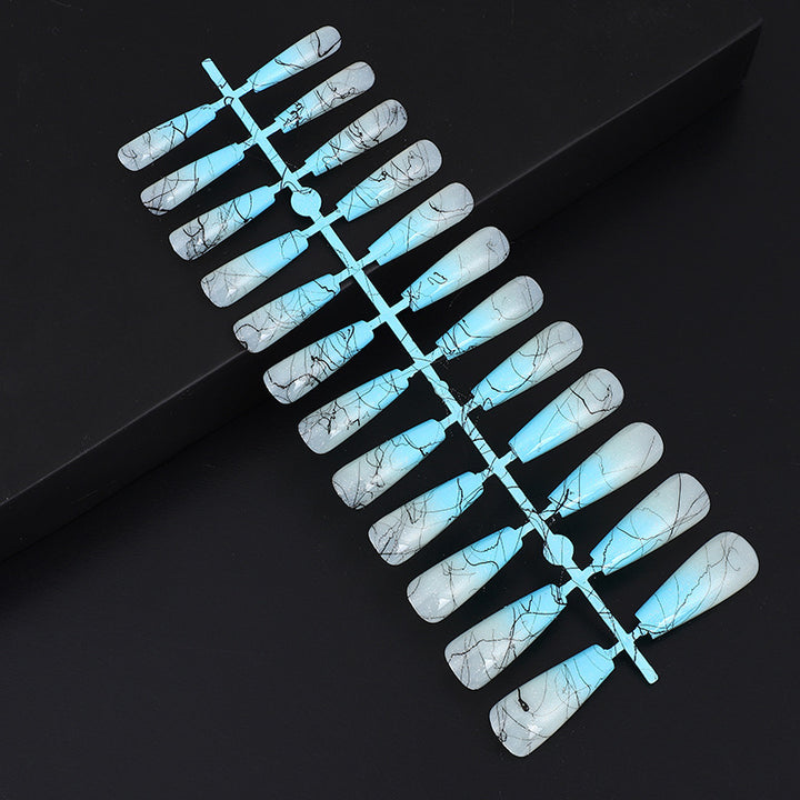 Artificial nails in modern ombre design with marbled accents Bowlift