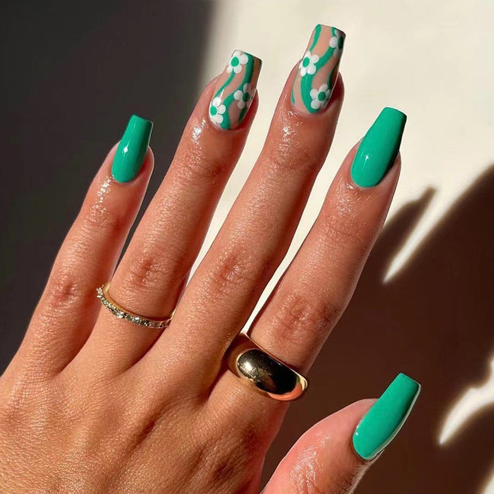 Artistic Nail Extensions in a Modern Floral Design Bowlift