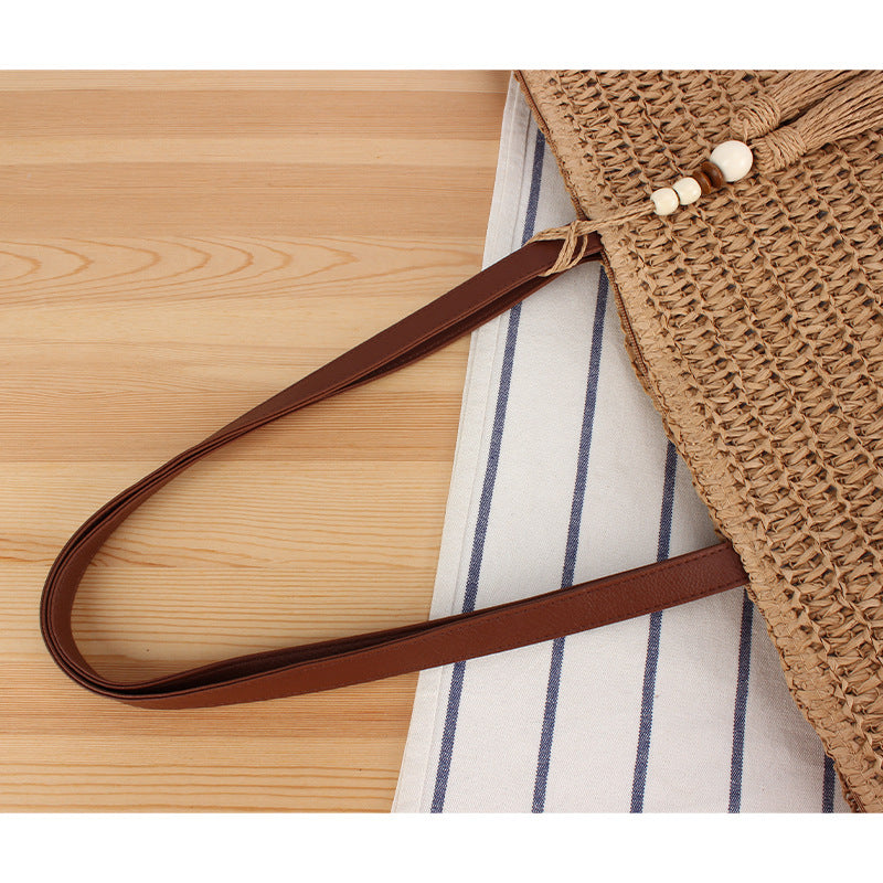 Handbag Made of Braided Natural Material with Tassel Decoration Bowlift