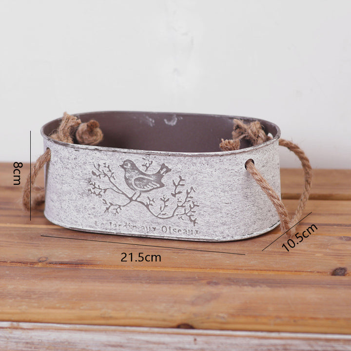 Decorative storage basket made of metal with natural design Bowlift