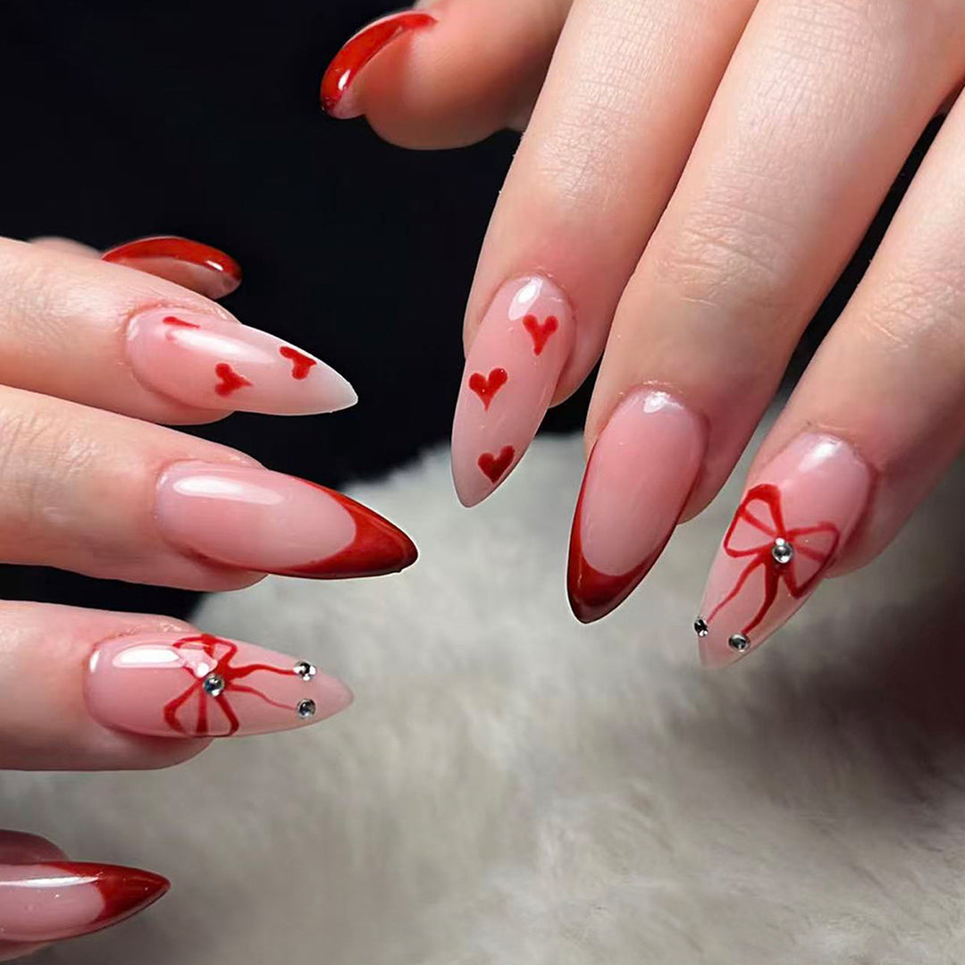 Artificial nails with elegant heart designs and glamorous accents Bowlift