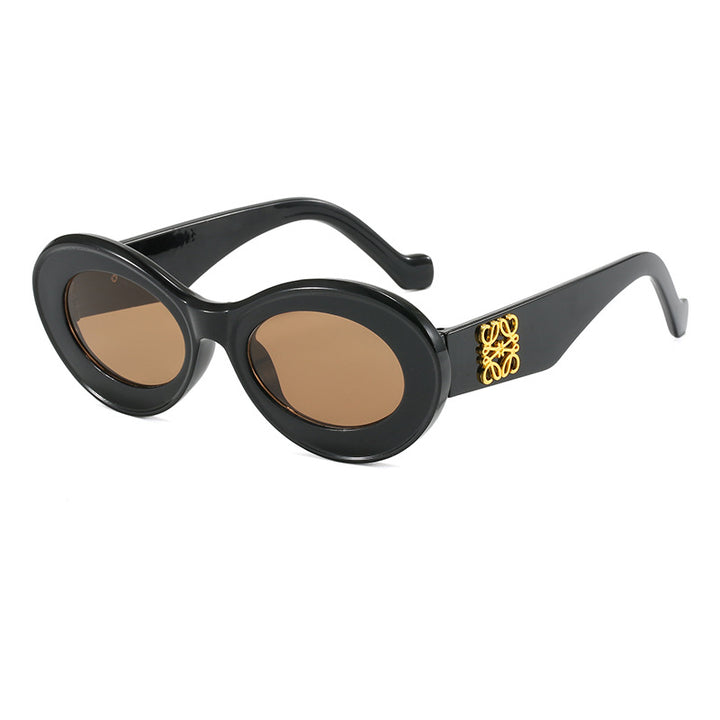 Women's fashionable sunglasses with oval frame and golden applications Bowlift
