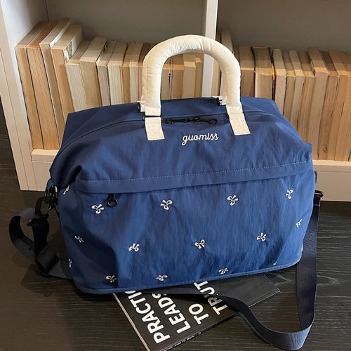 Embroidered Utility Travel Bag