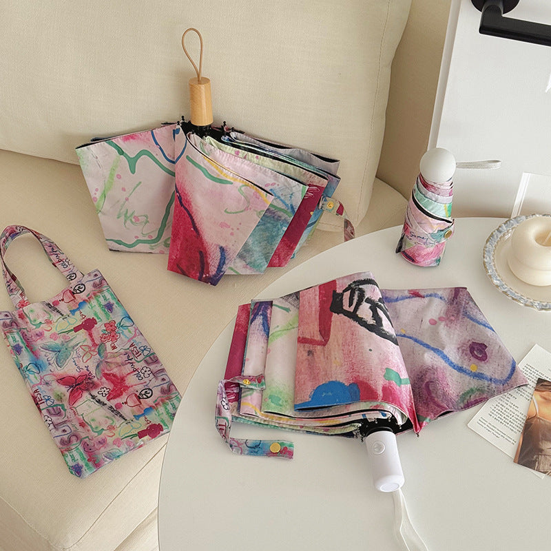 Women’s Foldable Tote Bag with Integrated Umbrella Bowlift