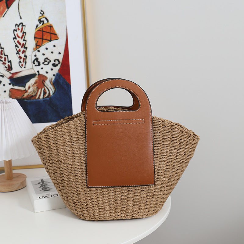 Fashionable basket bag with elegant leather accents Bowlift