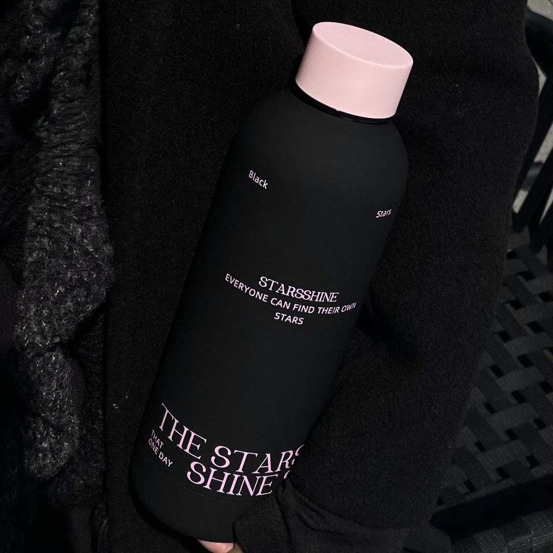 Women's insulated bottle with ergonomic design and practical carrying strap Bowlift