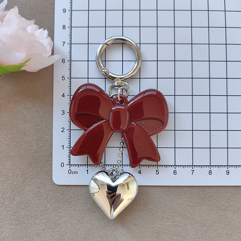 Keychain with bow and heart motif Bowlift