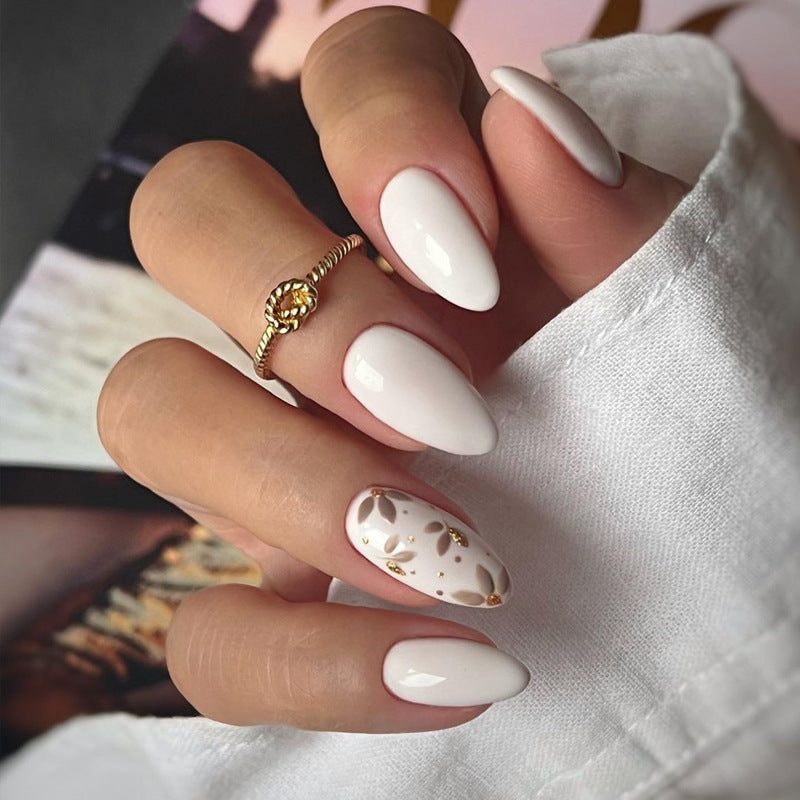 Elegant Stiletto Press-On Nail Art with Rhinestone Accents Bowlift