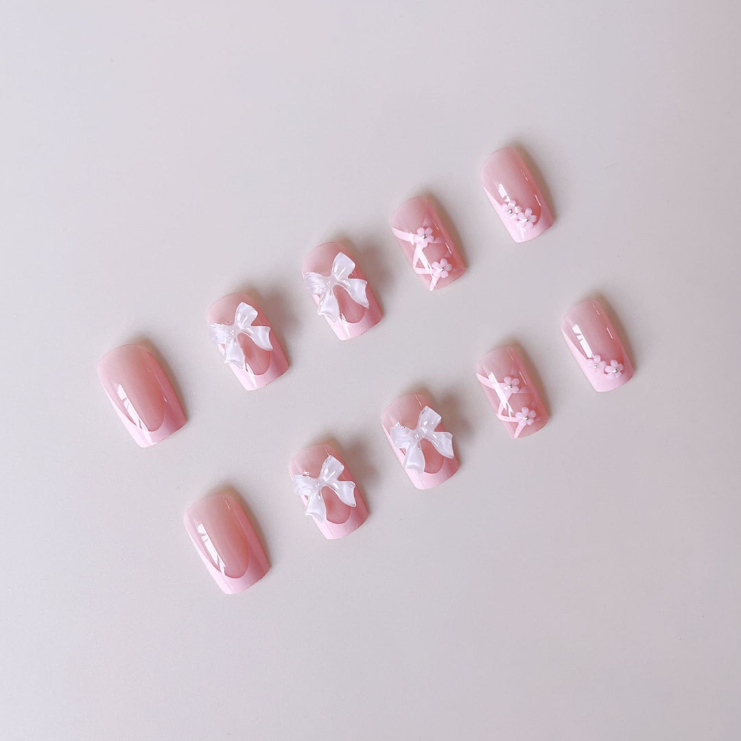 Artificial nail set with filigree 3D flowers and bows Bowlift