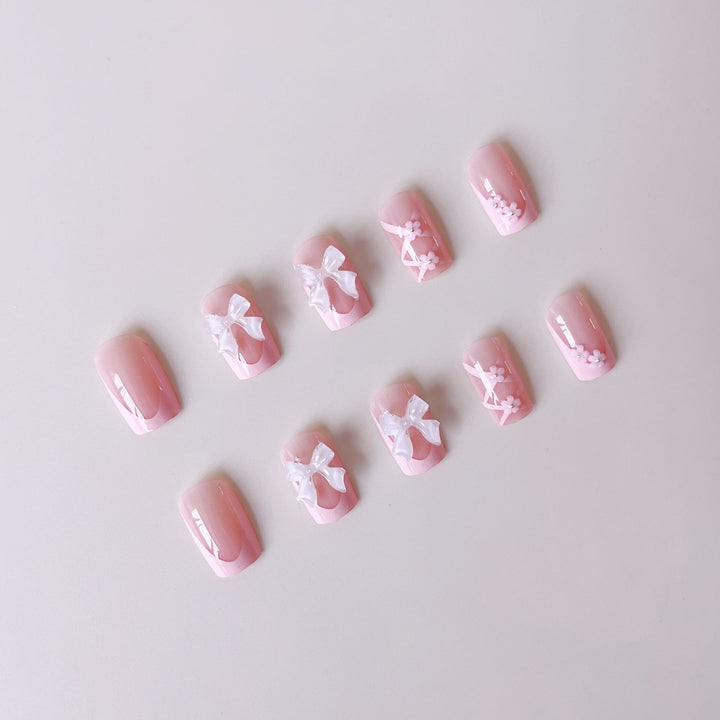 Artificial nail set with filigree 3D flowers and bows Bowlift