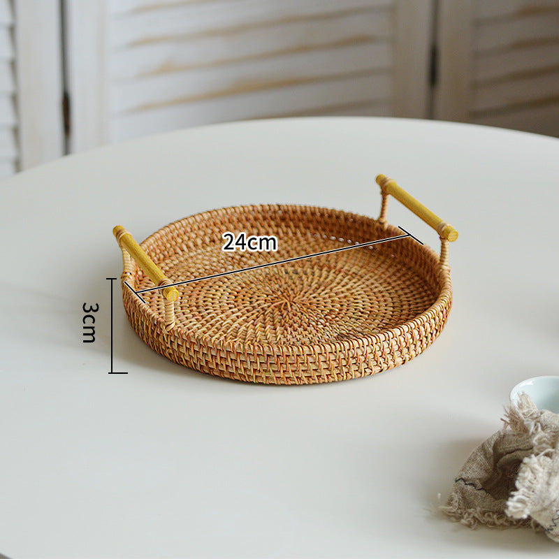 Round serving platter made of braided rattan Bowlift