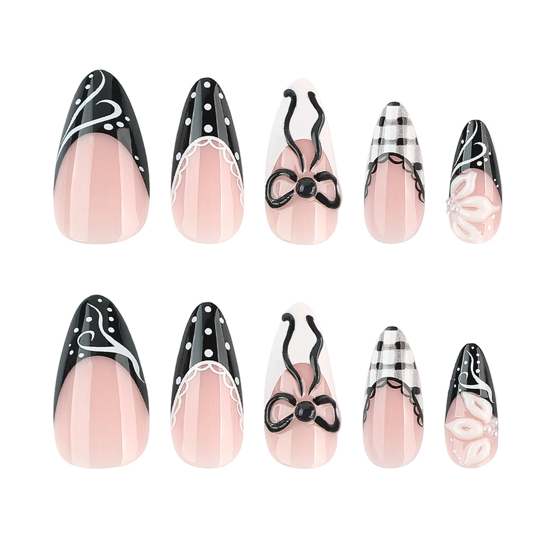 Artful stiletto nails with floral and geometric accents Bowlift