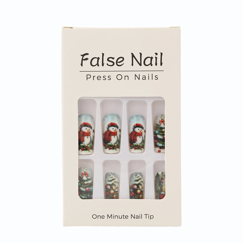 Creative artificial nails in festive Christmas design Bowlift