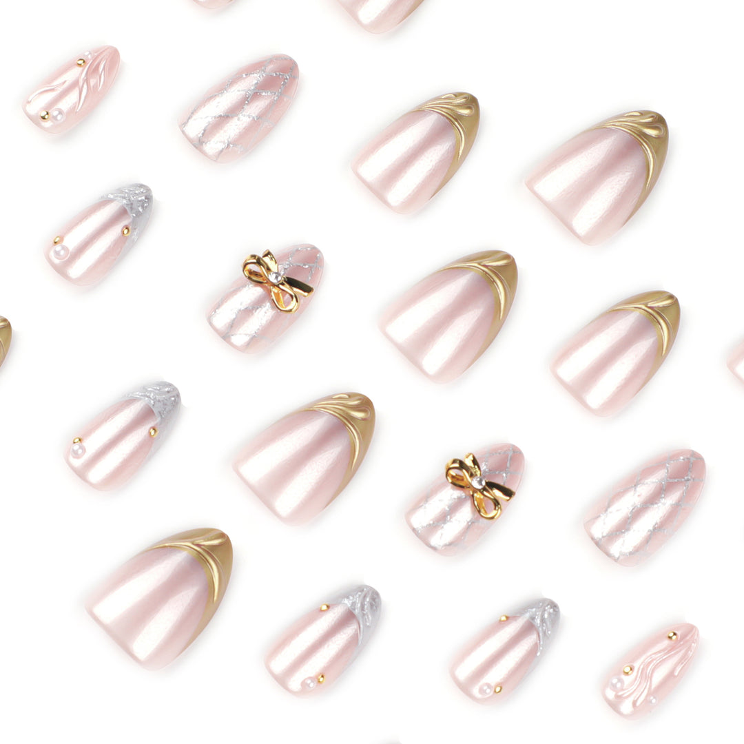 Artful stiletto nails with glitter and flower accents Bowlift