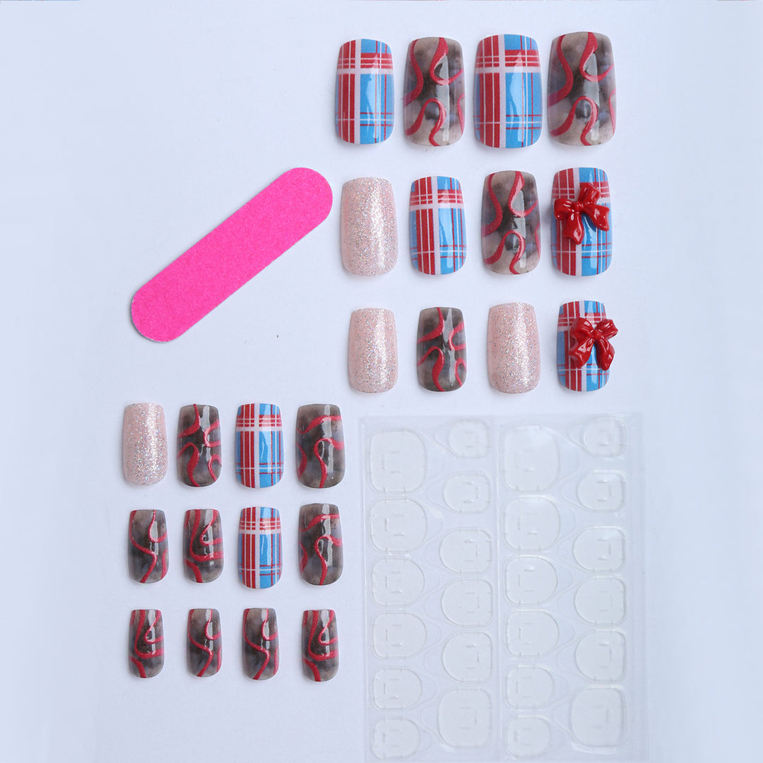 Artificial nails with festive gift design and glitter Bowlift